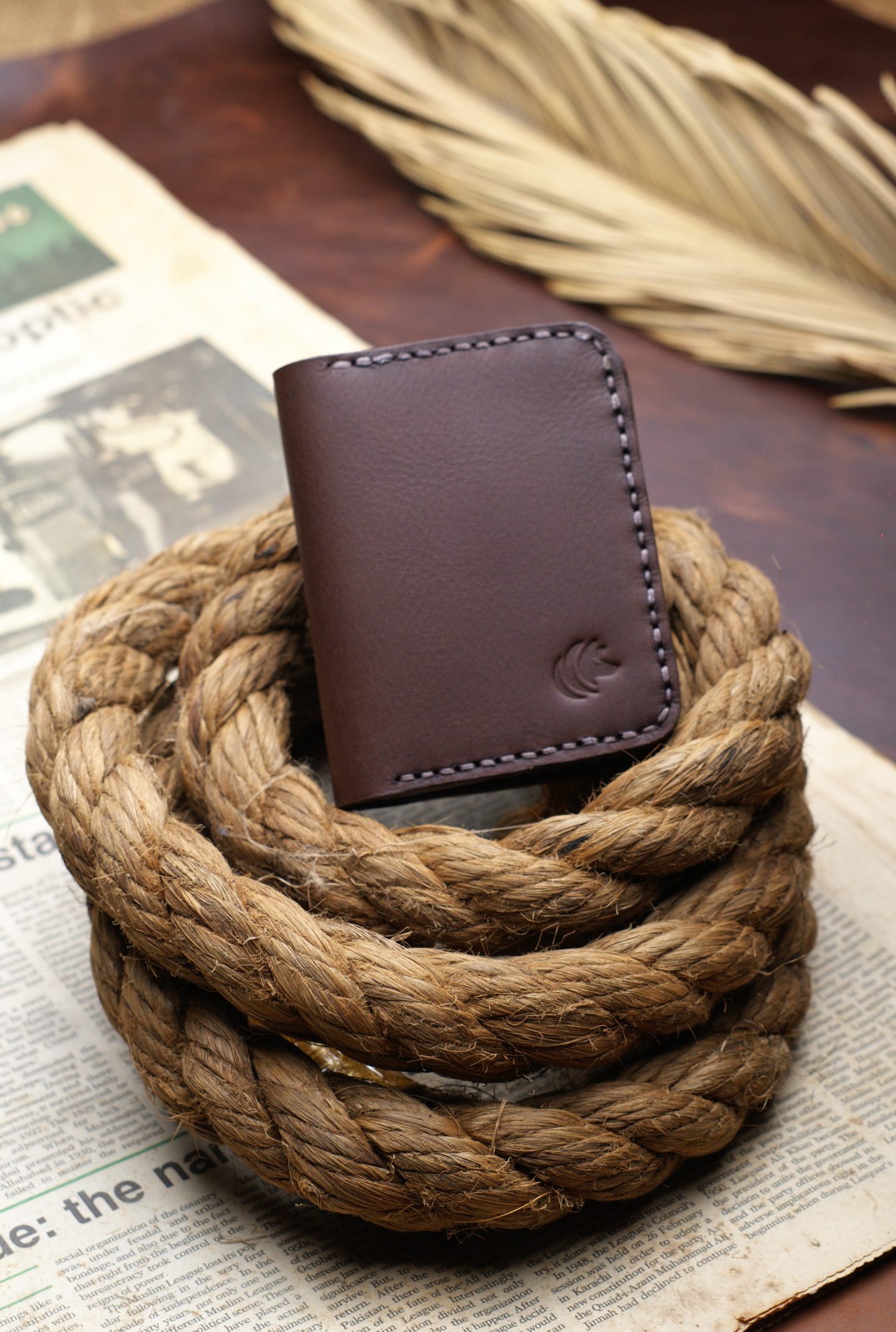 The Vertical Vogue: A Bifold Leather Wallet